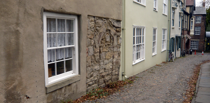 The south side of Abbey House, showing the remains of a medieval wall incorporated into the building. This was probably a part of Lye Gate, one of the Castle's many gates, all of which have now disappeared.